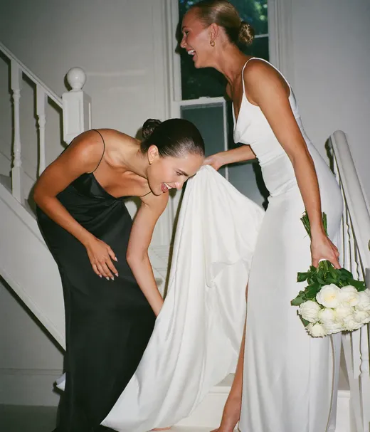 Flash photo on the stairs at a wedding, shot by a guest